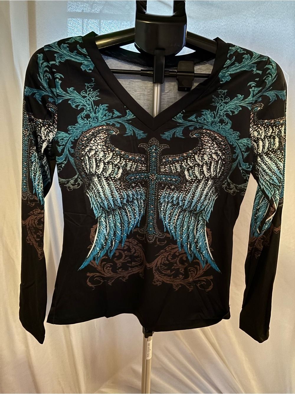 V-Neck Long Sleeve Top with Teal Wing & Cross Graphic - Women